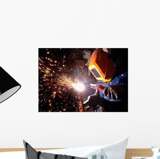 Hull Technician Practices Cutting Wall Decal