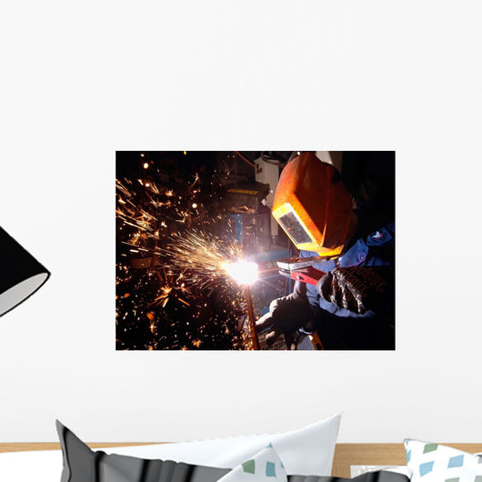Hull Technician Practices Cutting Wall Decal
