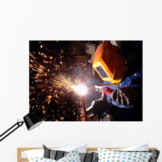 Hull Technician Practices Cutting Wall Decal