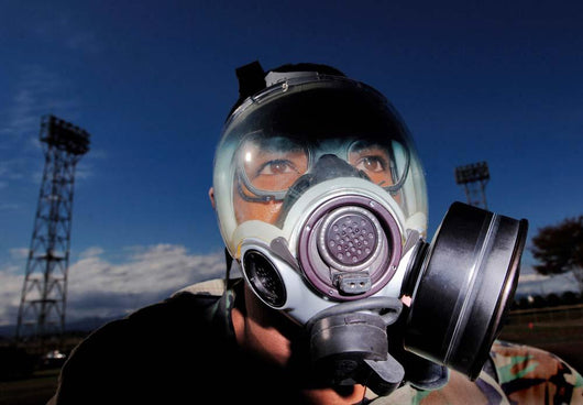 Airman Processes through Contaminated Wall Decal
