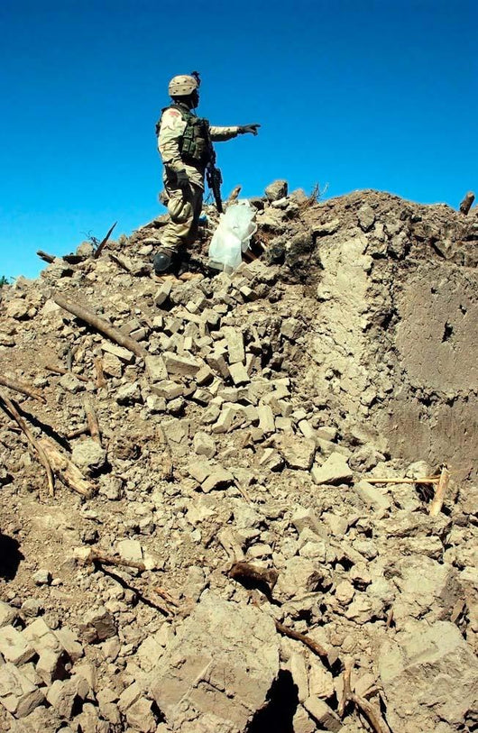 Us Army Soldier Examines Wall Decal