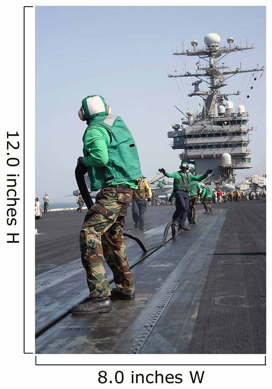Air Department Crewmembers Remove Wall Decal