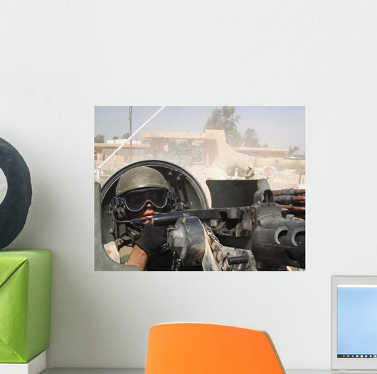 Soldier Pulls Security from Wall Decal