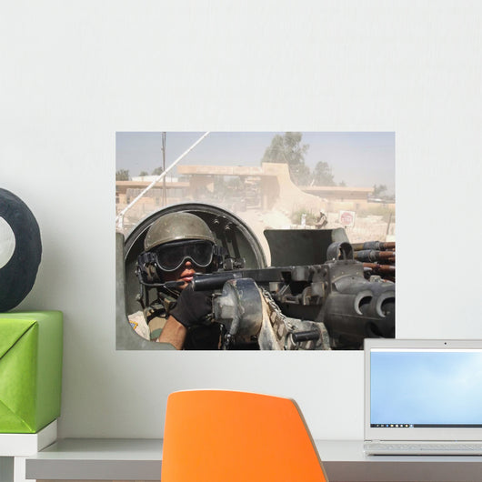 Soldier Pulls Security from Wall Decal