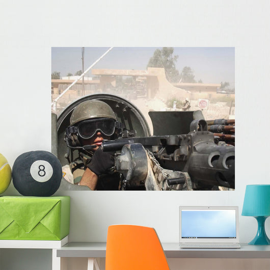 Soldier Pulls Security from Wall Decal