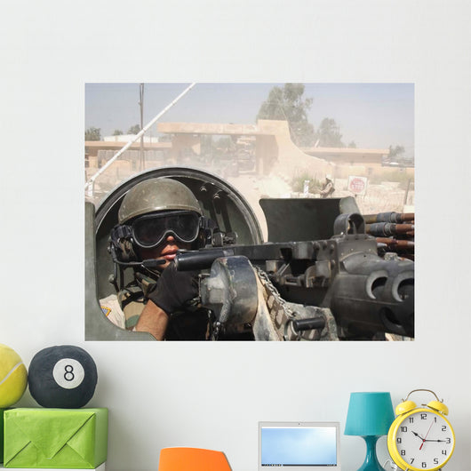 Soldier Pulls Security from Wall Decal