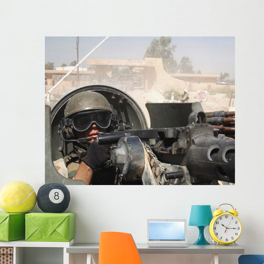 Soldier Pulls Security from Wall Decal