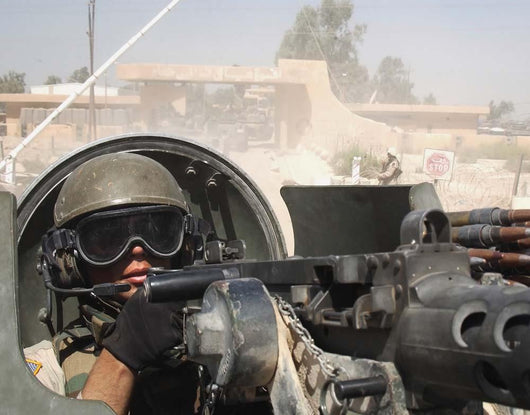Soldier Pulls Security from Wall Decal