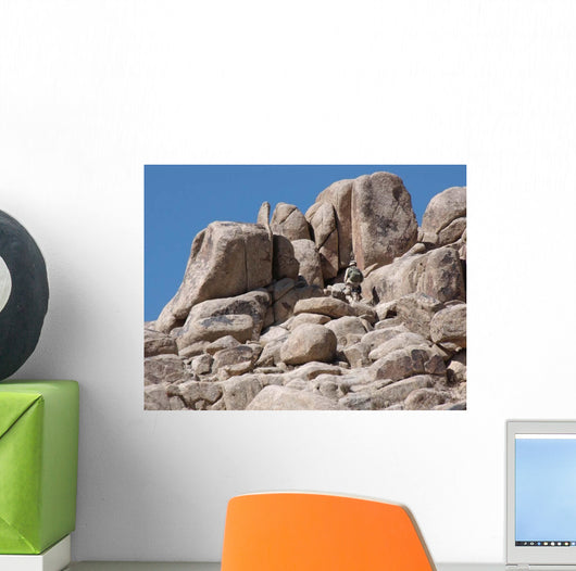 Soldier Climbs Mountain Wall Decal