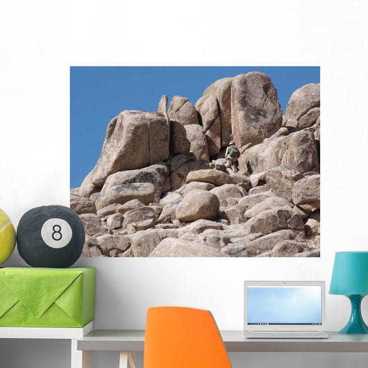 Soldier Climbs Mountain Wall Decal