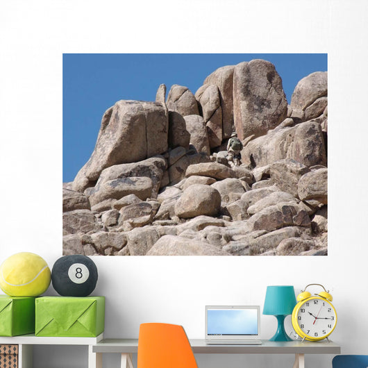 Soldier Climbs Mountain Wall Decal