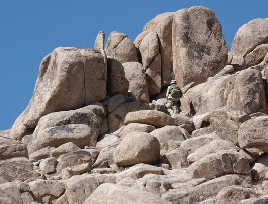 Soldier Climbs Mountain Wall Decal