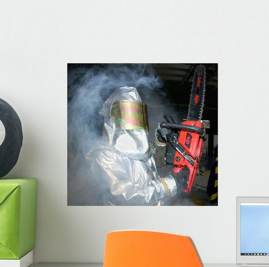 Airman Handles Chainsaw during Wall Decal