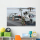 Helicopter Crews Change out Wall Decal
