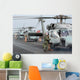 Helicopter Crews Change out Wall Decal