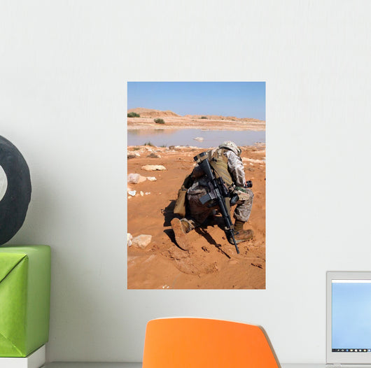 Soldier Patrols along Riverbed Wall Decal