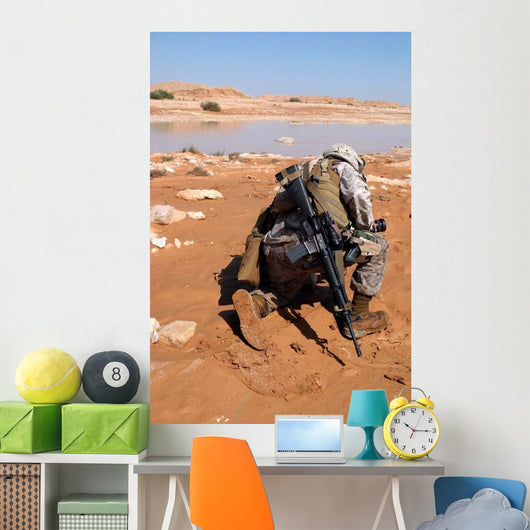 Soldier Patrols along Riverbed Wall Decal