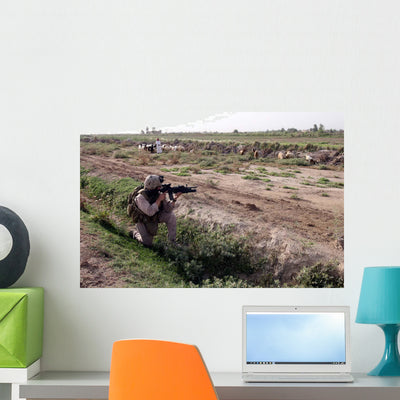 Soldier Scans Distance with Wall Decal shown on a wall
