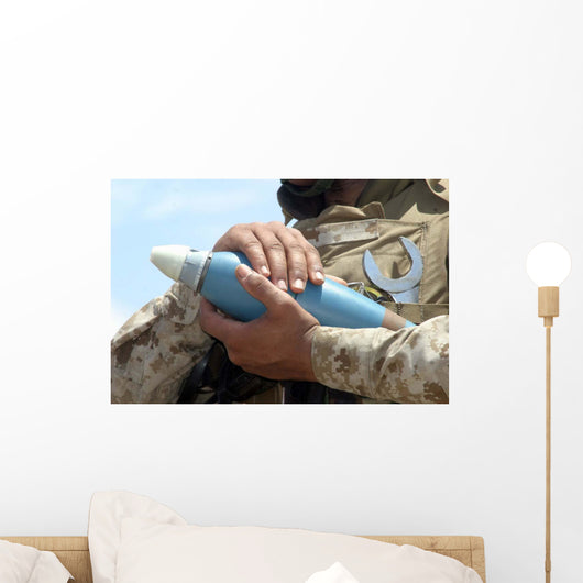 Close-up Soldier Cradling Munition Wall Decal
