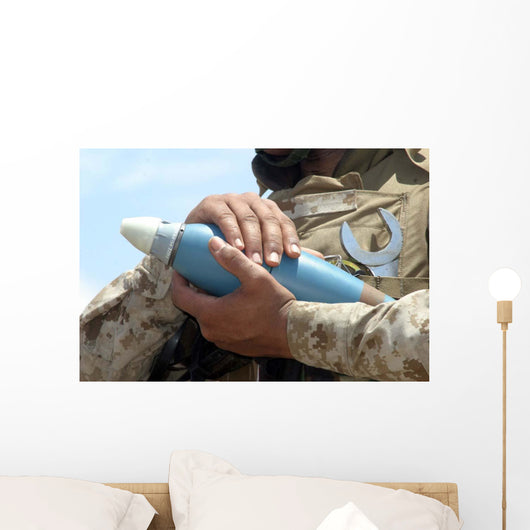 Close-up Soldier Cradling Munition Wall Decal