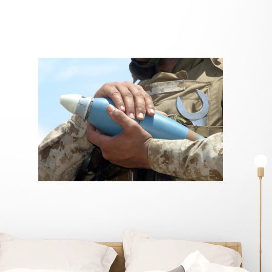 Close-up Soldier Cradling Munition Wall Decal