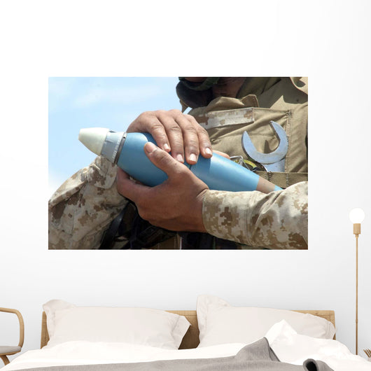 Close-up Soldier Cradling Munition Wall Decal