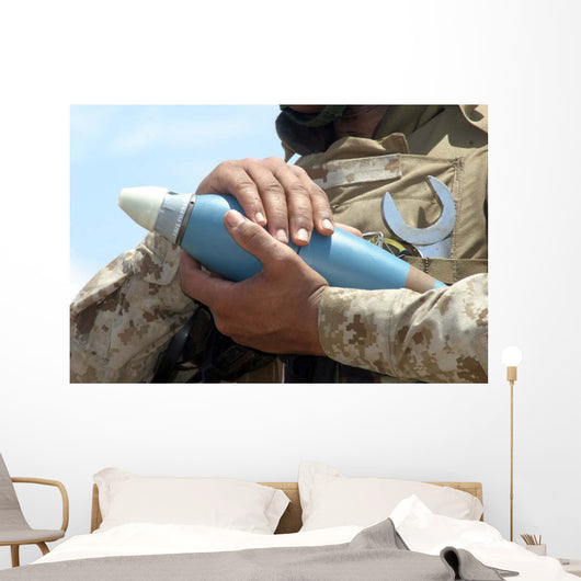 Close-up Soldier Cradling Munition Wall Decal