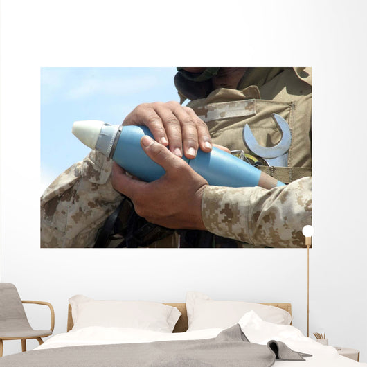Close-up Soldier Cradling Munition Wall Decal