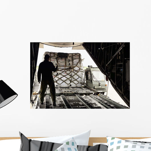 Supplies Are Loaded into Wall Decal