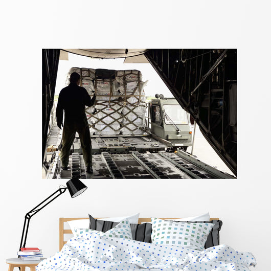 Supplies Are Loaded into Wall Decal