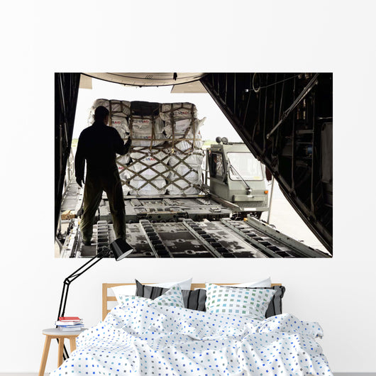 Supplies Are Loaded into Wall Decal