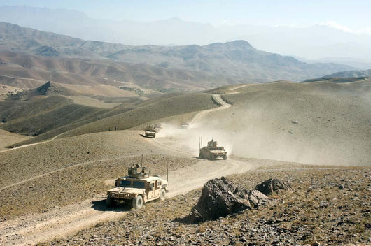 Humvees Traverse Rugged Mountain Wall Decal