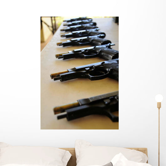Handguns Lined up Table Wall Decal