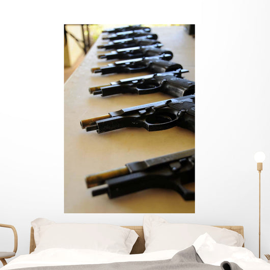 Handguns Lined up Table Wall Decal