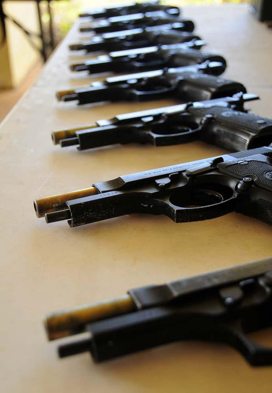 Handguns Lined up Table Wall Decal