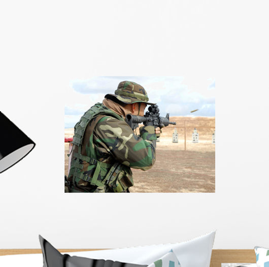 Soldier Fires Rounds down Wall Decal