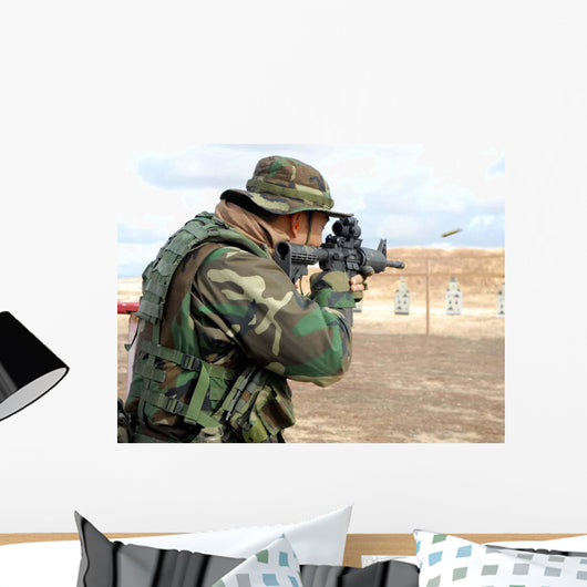Soldier Fires Rounds down Wall Decal