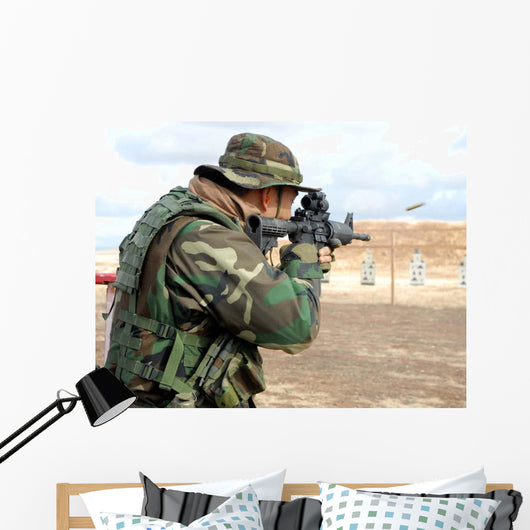 Soldier Fires Rounds down Wall Decal