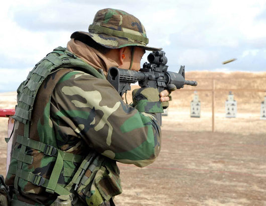 Soldier Fires Rounds down Wall Decal