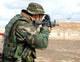 Soldier Fires Rounds down Wall Decal