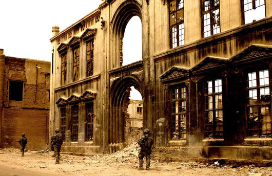 Soldiers Patrolling past Facade Wall Decal