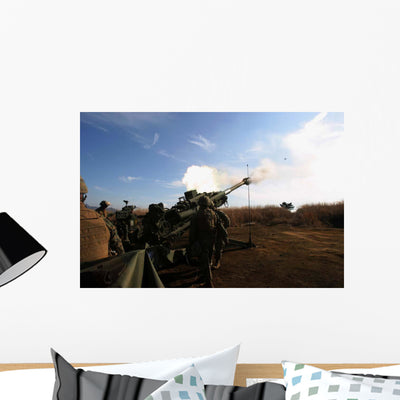 Artillerymen Fire 155mm round Wall Decal shown on a wall
