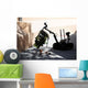 Talon Remote-controlled Robot Investigates Wall Decal