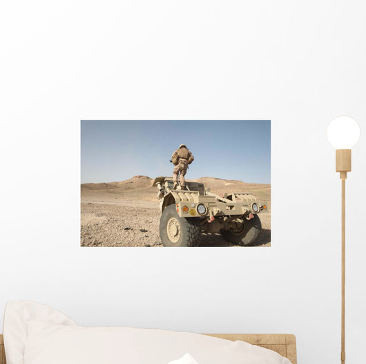 Soldier Climbs Damaged Husky Wall Decal