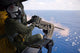 Naval Aircrewman Fires 50-caliber Wall Decal