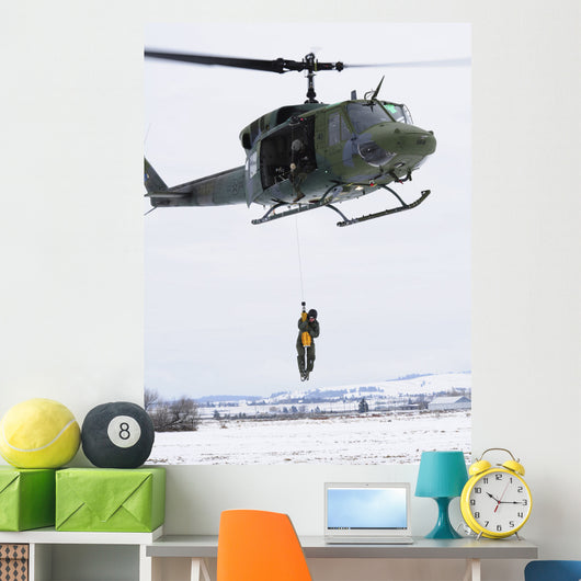 Student Is Hoisted into Wall Decal