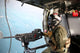 Naval Aircrewman Mans 50-caliber Wall Decal