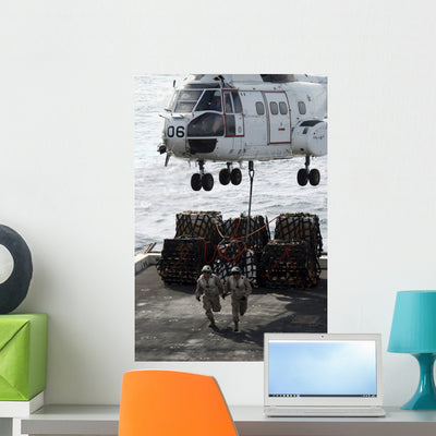 Marines Run out from Wall Decal shown on a wall