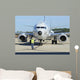 Aviation Electronics Technician Prepares Wall Decal