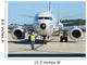 Aviation Electronics Technician Prepares Wall Decal